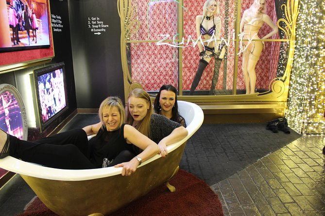 2-Hour Vegas Strip Walking Tour with Photos,Champagne & Vintage Vegas Goody Bags - Stop 5: The Park for changing waterfall lights and the 60-ft ballerina