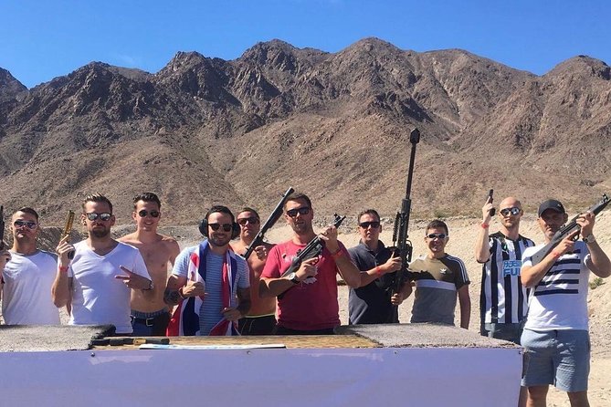 4 Gun Desert Shooting Adventure with Lunch - The four-gun lineup: Glock, MP59, UZI, and the .50 cal Barrett