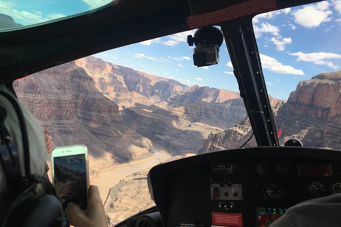Grand Canyon Helicopter and Western Ranch Adventure Landing Tour - The Airbus AS 350 cabin: small seats, headphones, and real safety checks