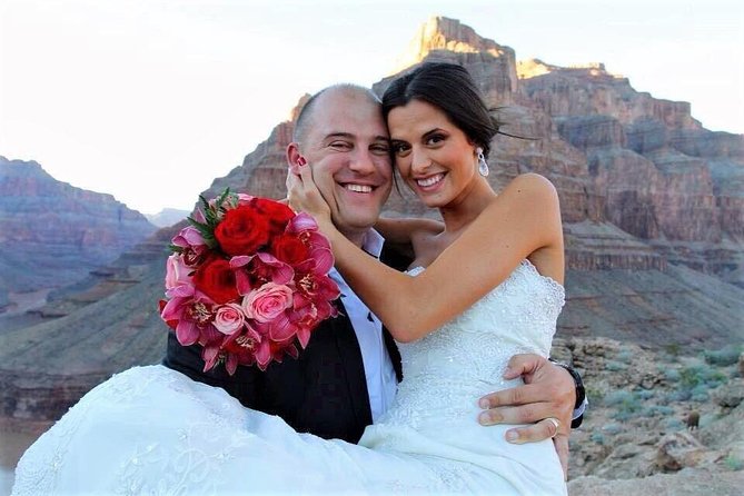 Grand Canyon Helicopter Wedding - The ceremony stop: minister-led vows, roses, champagne, and photos