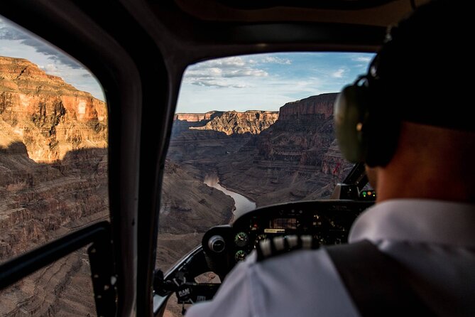 Grand Canyon West Rim Luxury Helicopter Tour from Las Vegas - Entering the Grand Canyon West Rim: Colorado River, cathedral buttresses, and photo spots