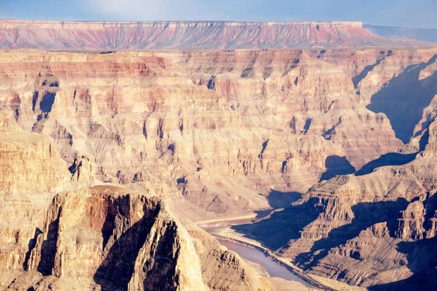Las Vegas: Grand Canyon Helicopter Air Tour with Vegas Strip - The Canyon Moment: Flying Below the Rim at Grand Canyon West