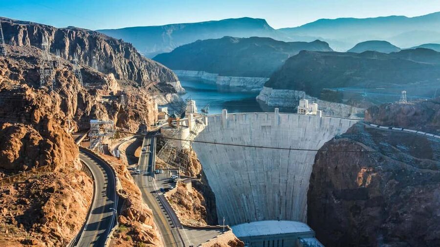 Las Vegas: Hoover Dam Tunnels & Power Plant Tour - From pickup to the Welcome to Fabulous Las Vegas sign photo moment