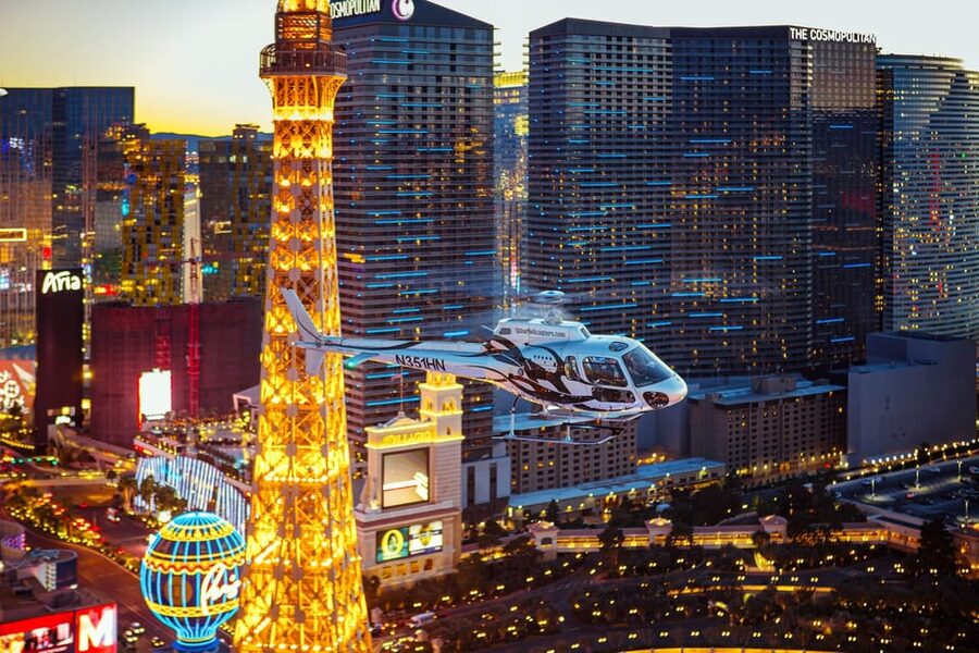 Las Vegas: Nighttime Helicopter Flight over the Strip - Fremont Street, Bellagio Fountains, and the Luxor Space Beam View