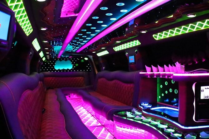 Private Transfer: Las Vegas to LAS Airport by Luxury SUV or Limousine up to 8 p - Inside the ride: water, optional champagne, and calm driving