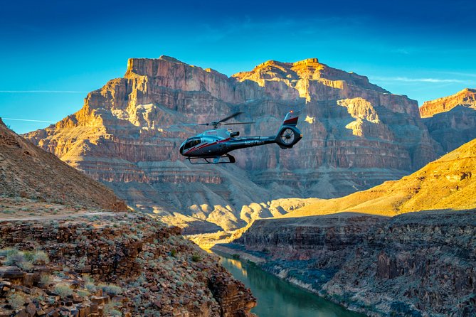 Sunset Grand Canyon Helicopter Tour from Las Vegas - Taking Off Over Lake Mead and Hoover Dam